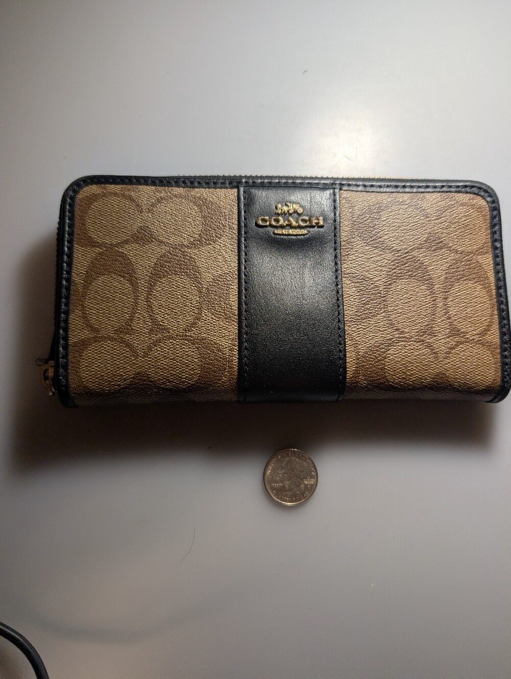 Coach Signature Canvas Zip-Around Wallet in Brown and Black